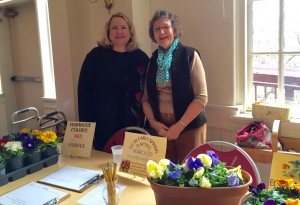 Leslie Tahsler and Sue Martin are ready to take orders for the ECW's annual plant sale.